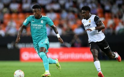 西甲-3分钟2球!维尼修斯本泽马互传射 皇马2-1瓦伦